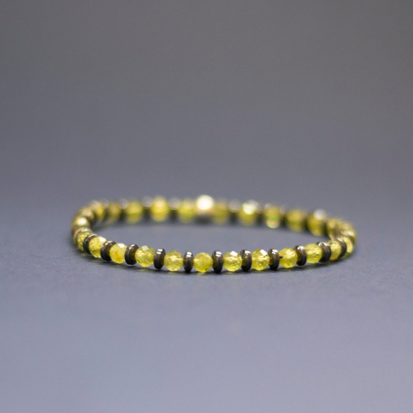 Peridot and grey Hematite Bracelet 4mm facet – Pulse Collection - Aquarius Stones