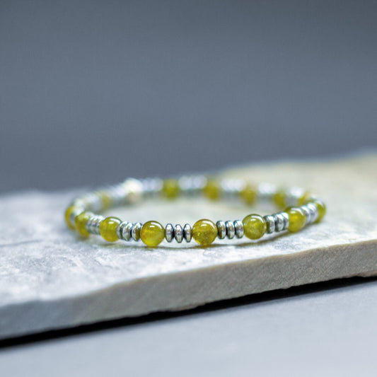 Peridot and Hematite 6mm β Alien bracelet - Aquarius Stones