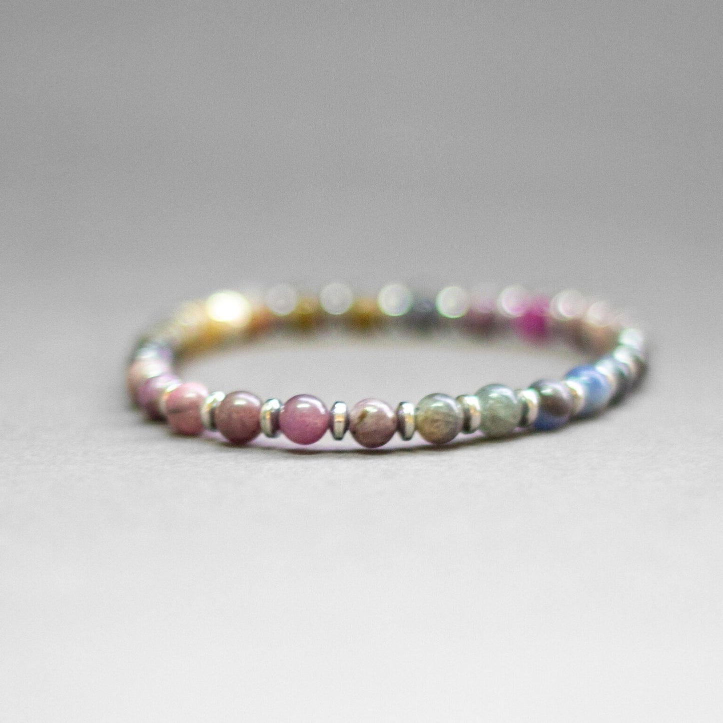 Multicolor Sapphire and Silver Hematite bracelet 6mm – Pulse Collection - Aquarius Stones