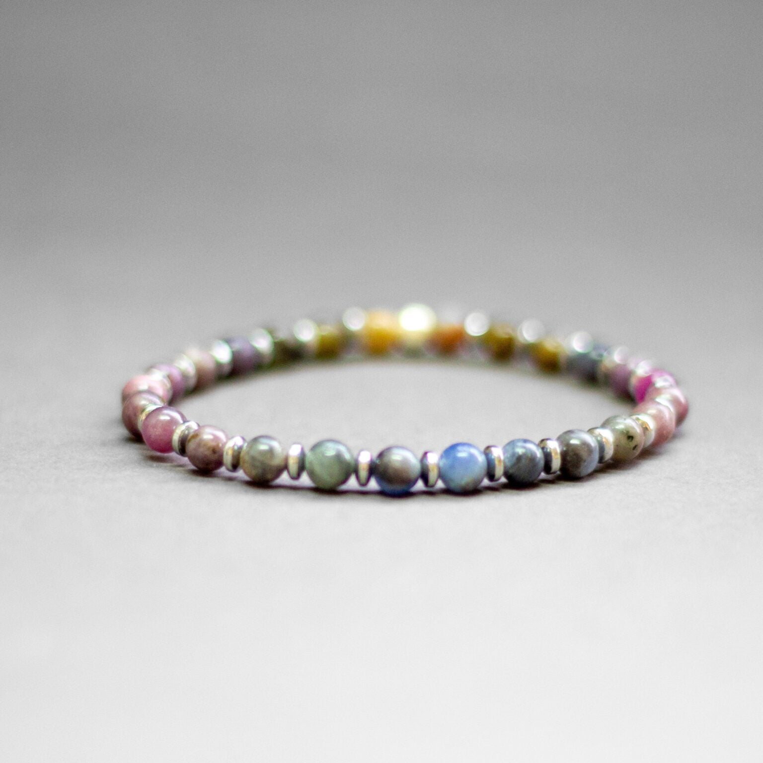 Multicolor Sapphire and Silver Hematite bracelet 6mm – Pulse Collection - Aquarius Stones