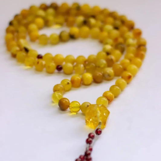 Amber Rosary – 100 Beads with Citrine center piece and Garnet counter - Aquarius Stones
